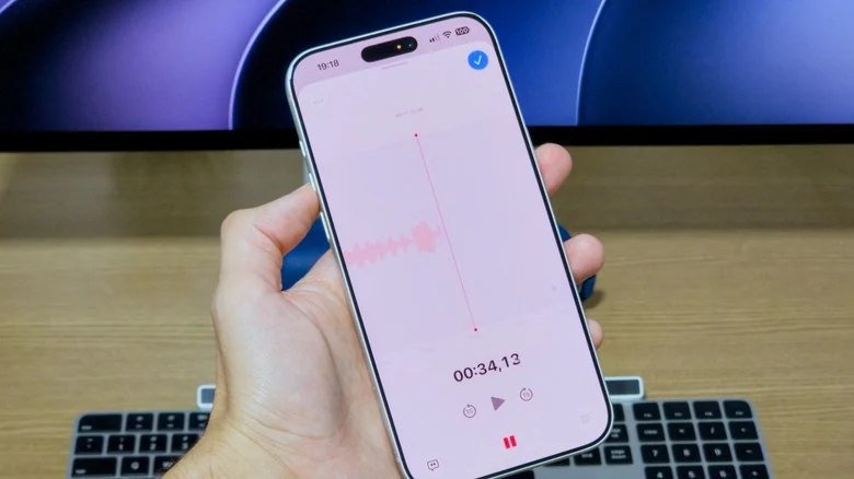 Recording a voice memo using Apple's built-in app on an iPhone.