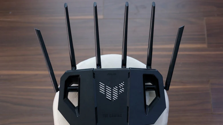 An ASUS TUF gaming router, with six antennae.