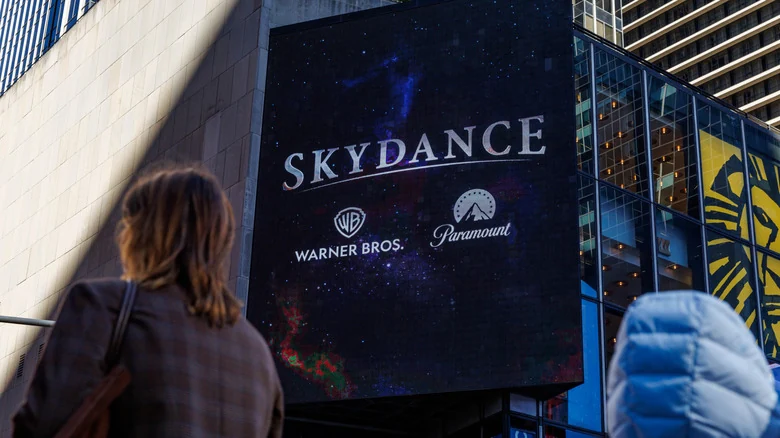 The Skydance, Warner Bros. and Paramount logos on a billboard in New York.