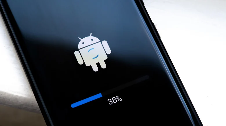 An Android phone running an update, showing its completion percentage.