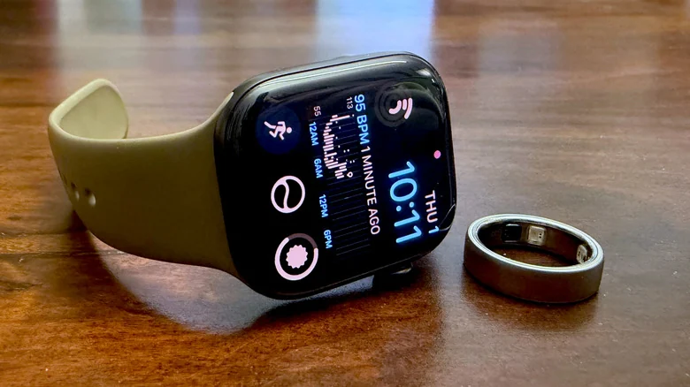 An Apple Watch Series 12 side-by-side with an Oura Ring 5.